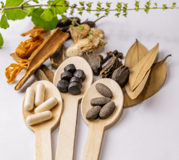 Ayurvedic herbal medicines with natural ingredients, tablets, and capsules for holistic wellness.